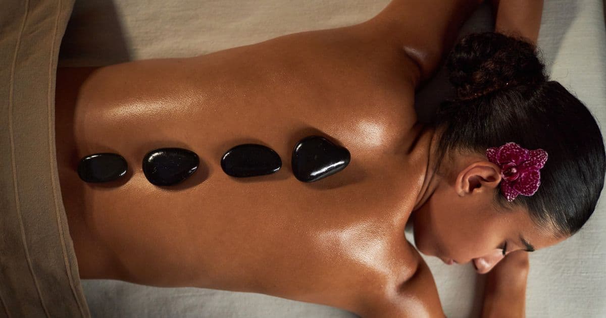 hotstones to womans back