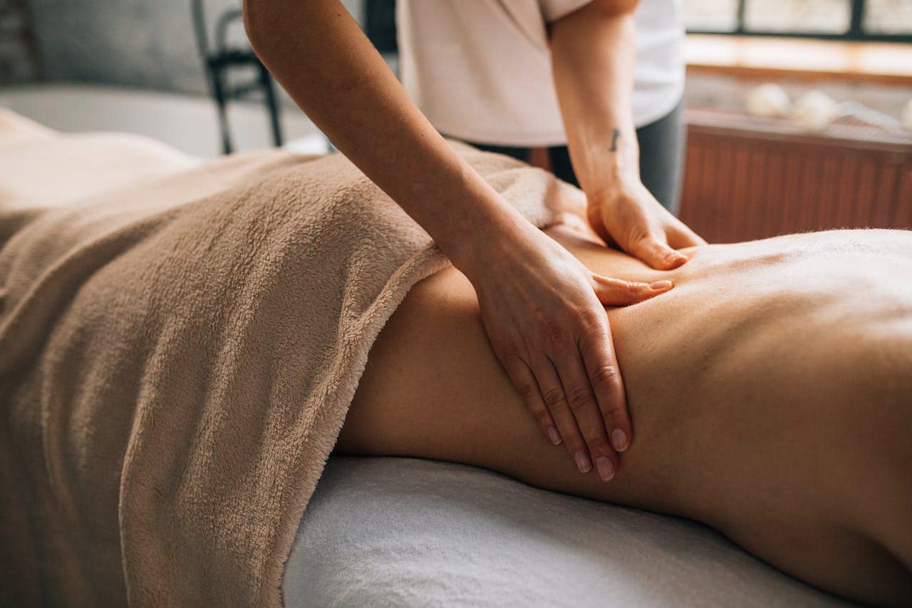 a close-up of a person getting trigger point therapy