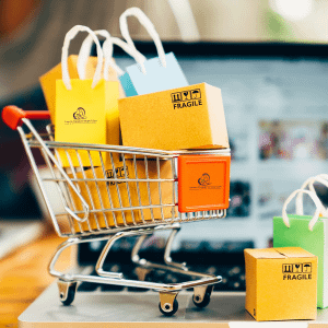 Shopping cart with boxes and shopping bags
