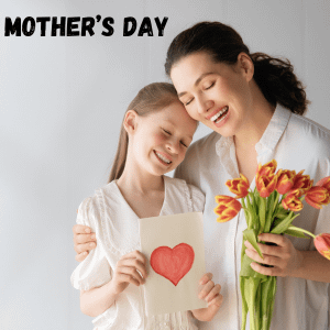 Mother and daughter with rose and card in hand