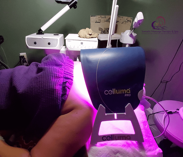 client with celluma LED light over face