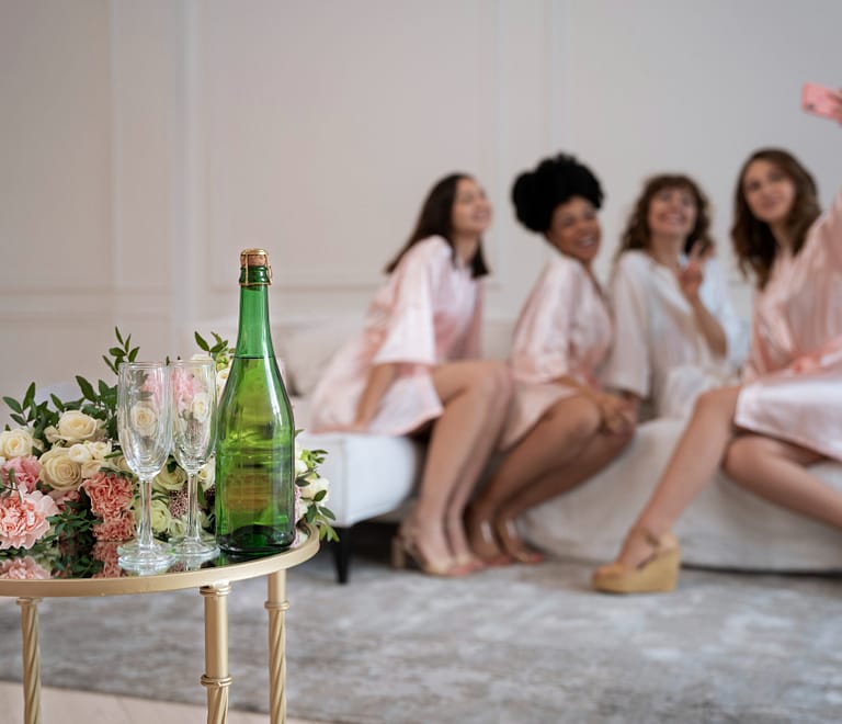 bridesmaids sitting on the couch at a massage day spa-Bachelorette party ideas