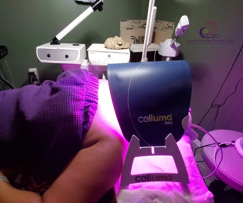 client with celluma LED light over face