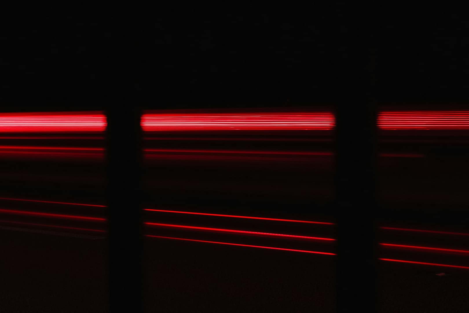 A picture showing a beam of red light.