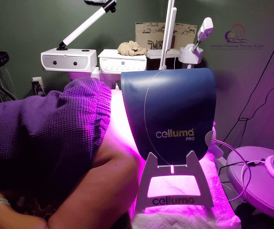 client with celluma LED light over face