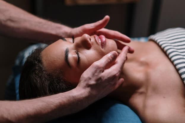 Breathwork and massage for deeper relaxation with focused face massage to ease tension.