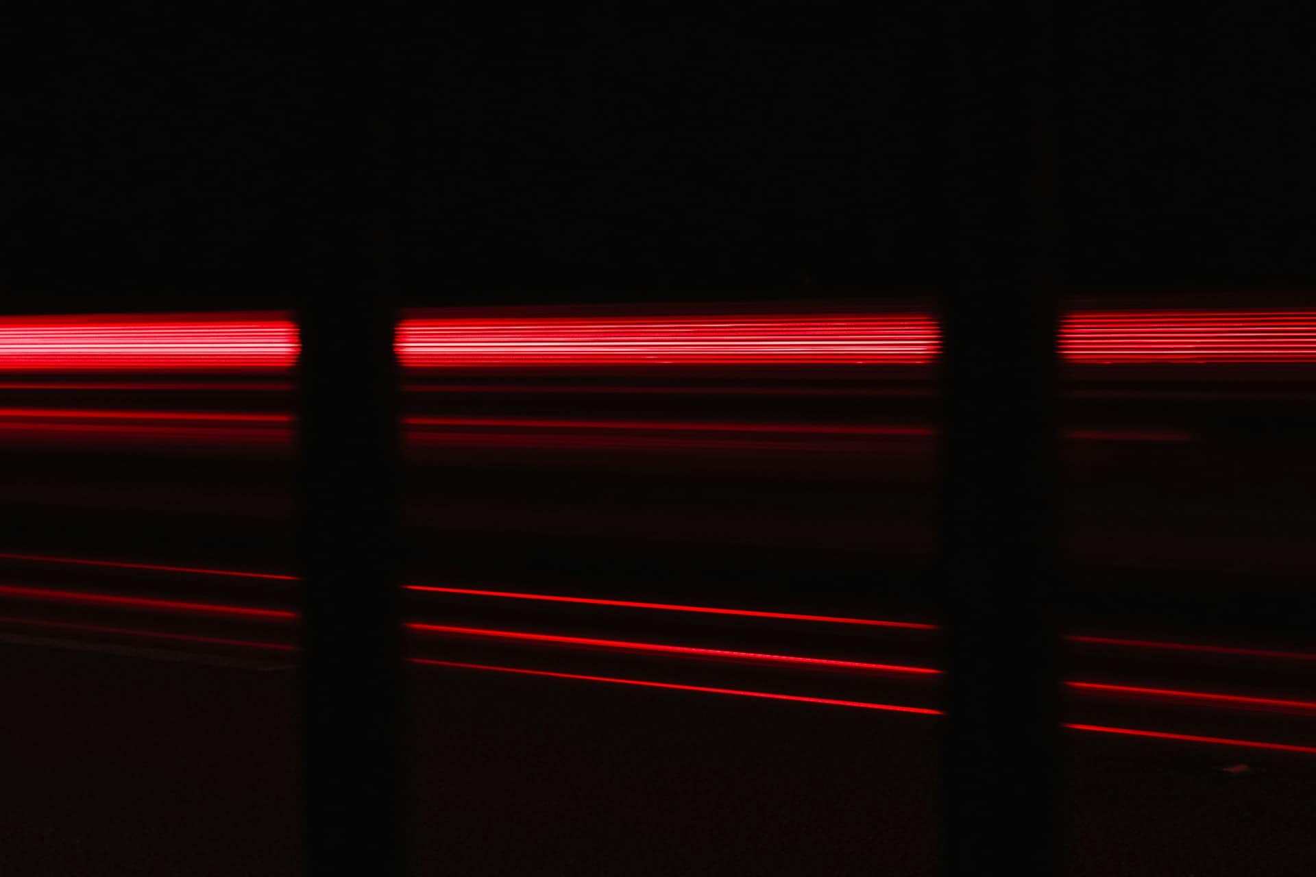 A picture showing a beam of red light.